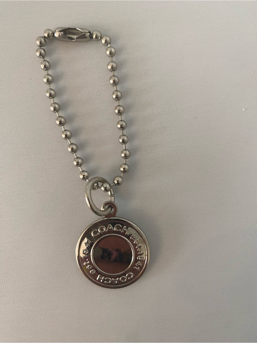 Coach Silver-Tone Round Logo Charm